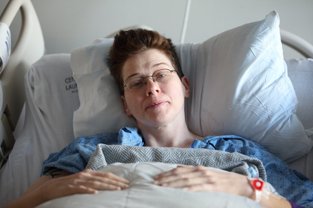 Female patient in hospital bed